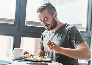 a man eating lunch