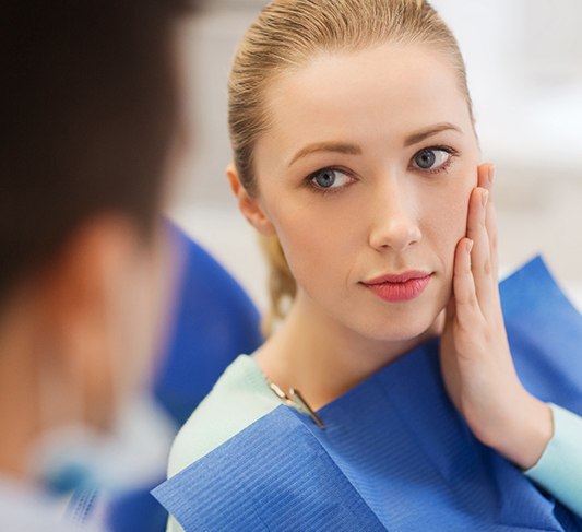 Patient listening to an emergency dentist in Raleigh