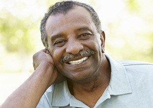 happy elderly man in nature 