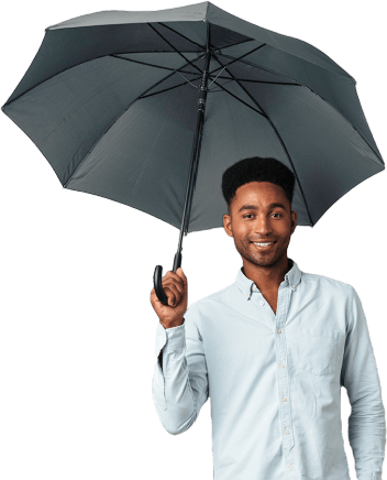 Smiling man holding umbrella