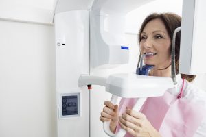 woman receiving digital x-ray scan