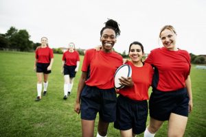 rugby team walking on a field