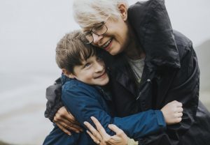 grandparent hugging child