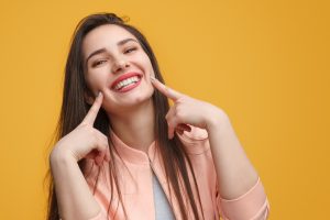 Woman with attractive smile after cosmetic dentistry in North Raleigh. 